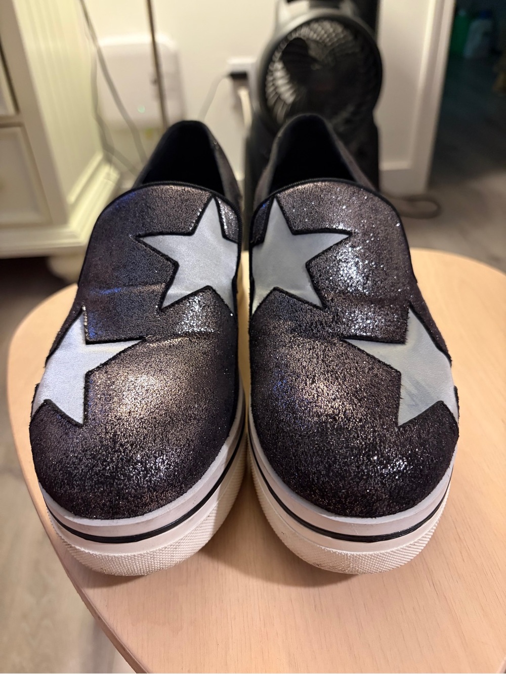 Stella McCartney Black Glitter Slip-On Sneakers with White Star Appliqués
